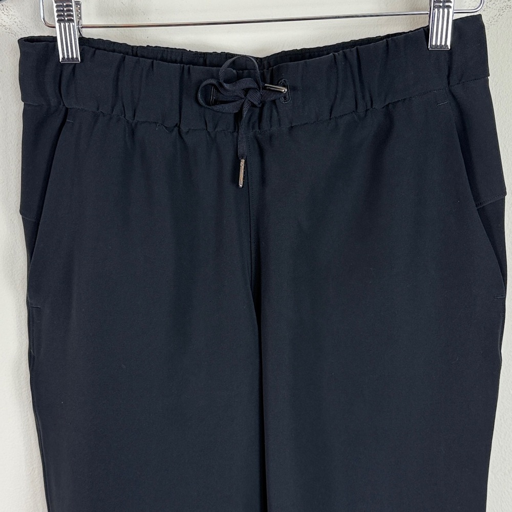 Lululemon On The Fly Crop Woven Pants 23” in Black Size 6 - Picture 9 of 10